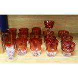 A quantity of cranberry flashed glasses including a set of five, the largest 18cm high