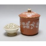 A Grainger’s or Locke Worcester pate-sur-pate jar and cover, the salmon ground decorated with