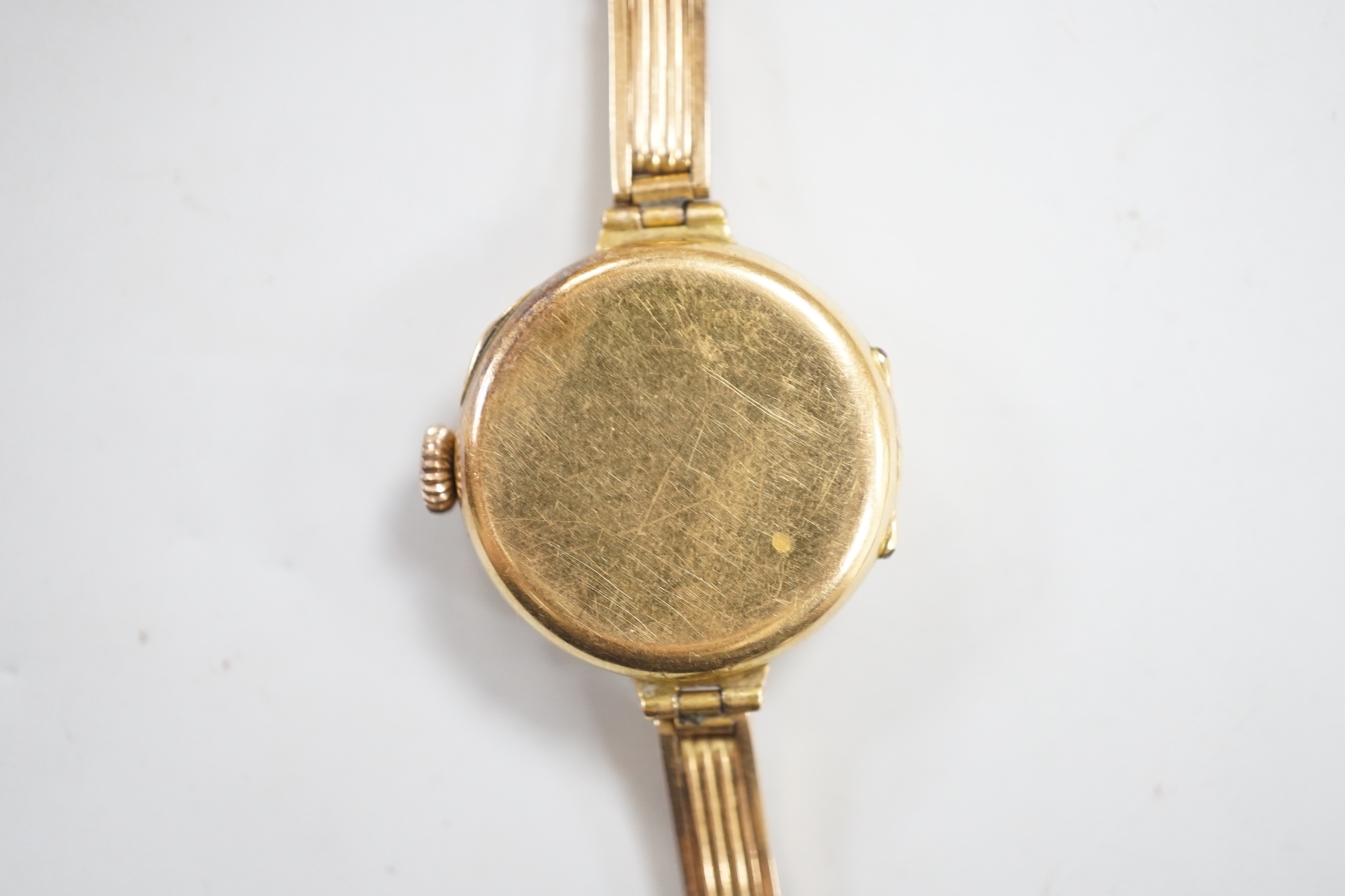 An early 20th century 18ct gold manual wind wrist watch, on an 18ct flexible bracelet, case diameter - Image 3 of 4