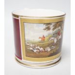 A 19th century English porcelain mug painted horses and riders with hunting dogs in a chase scene,