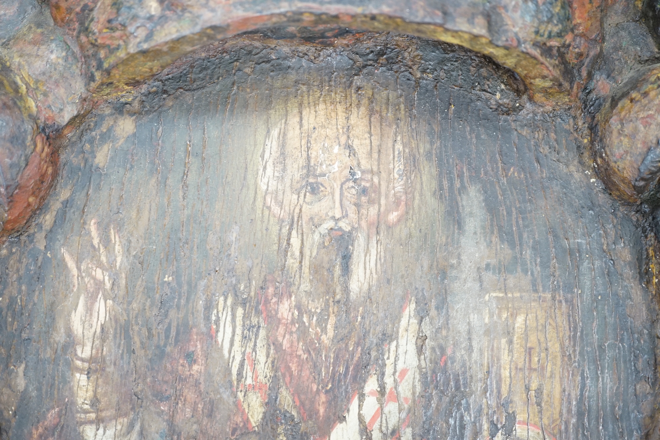 A 17th/18th century Icon, later hand painted in oil with a Saint holding a bible, the border - Image 3 of 5