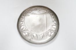 An Art Nouveau Liberty & Co pewter shallow circular dish, stamped on base and numbered 0231, 14cm