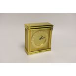 A Tiffany & Co. Swiss made brass clock with booklet, numbered 215885, 16cm high