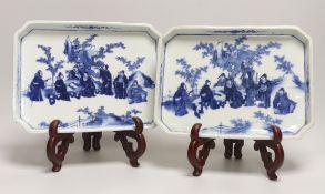 A pair of 19th century Chinese blue and white ‘Seven Sages of the bamboo grove’ dishes, 23.5cm long