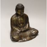 A 20th century bronze model of a seated Buddha, 22cm high