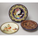 A Cauldon plate painted with blue tits on toadstools and a butterfly on another, signed R.