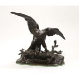 After Jules Moigniez (1835 - 1894), French bronze study of an eagle on a branch, signed, 23cm high