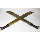 A WW2 U.S. military issue Disston machete and a True Temper machete, both dated 1943