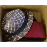 A Moroccan Fez and a Panama hat in a Dunn & Co hat box together with a hat stand