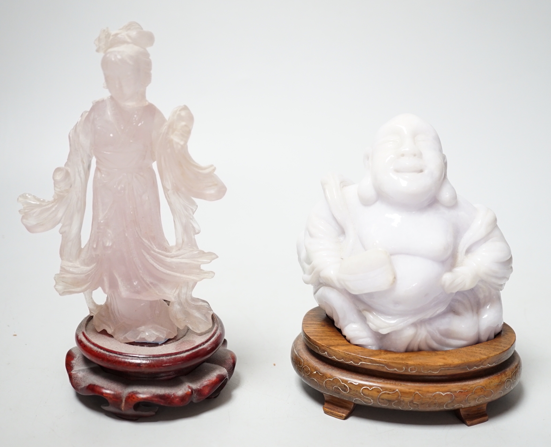 A Chinese jadeite figure of Budai, 11cm high and a rose quartz figure of a lady, wood stands