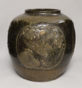 A large Chinese stoneware ovoid jar, decorated in relief with birds and flowers, possibly 19th