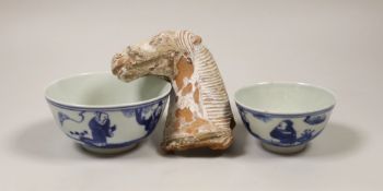 Chinese terracotta horse head, possibly Tang dynasty and two Chinese blue and white bowls