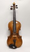 Likely German, a cased violin, late 19th/early 20th century, the back 14 inches in length