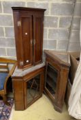 Three George III and later oak and mahogany hanging corner cupboards, largest 80cm, depth 44cm,