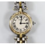 A lady's steel and gold Cartier Panthere quartz wrist watch, with Roman dial, case diameter 24mm, on