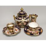 Seven pieces of Royal Crown Derby Imari porcelain including a trio and twin handled jar and cover,