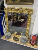 A 19th century carved giltwood and composition wall mirror, width 130cm, height 153cm