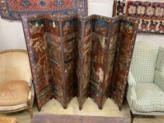 A Chinese lacquer eight fold dressing screen, each panel width 38cm, height 160cm