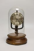 A Pinchin Johnson 800 day electric timepiece, under a glass dome, raised on a circular wood base,
