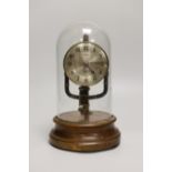 A Pinchin Johnson 800 day electric timepiece, under a glass dome, raised on a circular wood base,