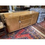 An Ercol light elm sideboard, length 155cm, depth 43cm, height 68cm