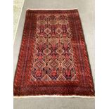 A Belouch blue ground rug, 170 x 106cm