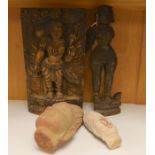 Two Indian carved stone deity heads and two Indian carved figures of Hindu deities, tallest 32cm