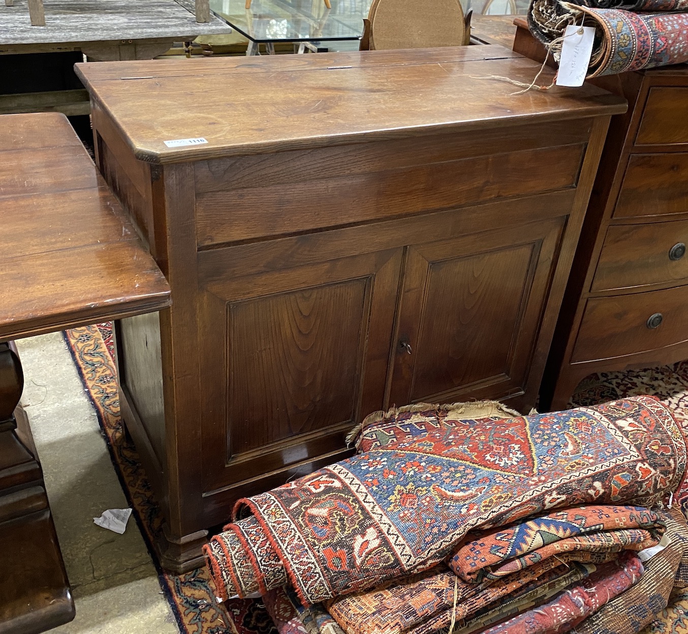 A 19th century French provincial oak hinged top side cabinet, width 107cm, depth 50cm, height 98cm