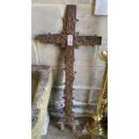 A painted cast iron cross, width 43cm, height 104cm