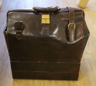 An Italian leather holdall, the base incorporating two detachable cases, with attached Concorde ‘’