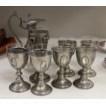 A set of six 20th century French pewter and glass goblets, together with larger example inset with