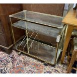 A mid century Italian brass and glass music / drinks trolley, width 80cm, depth 40cm, height 69cm