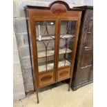An Edwardian mahogany display cabinet, width 82cm, depth 36cm, height 182cm