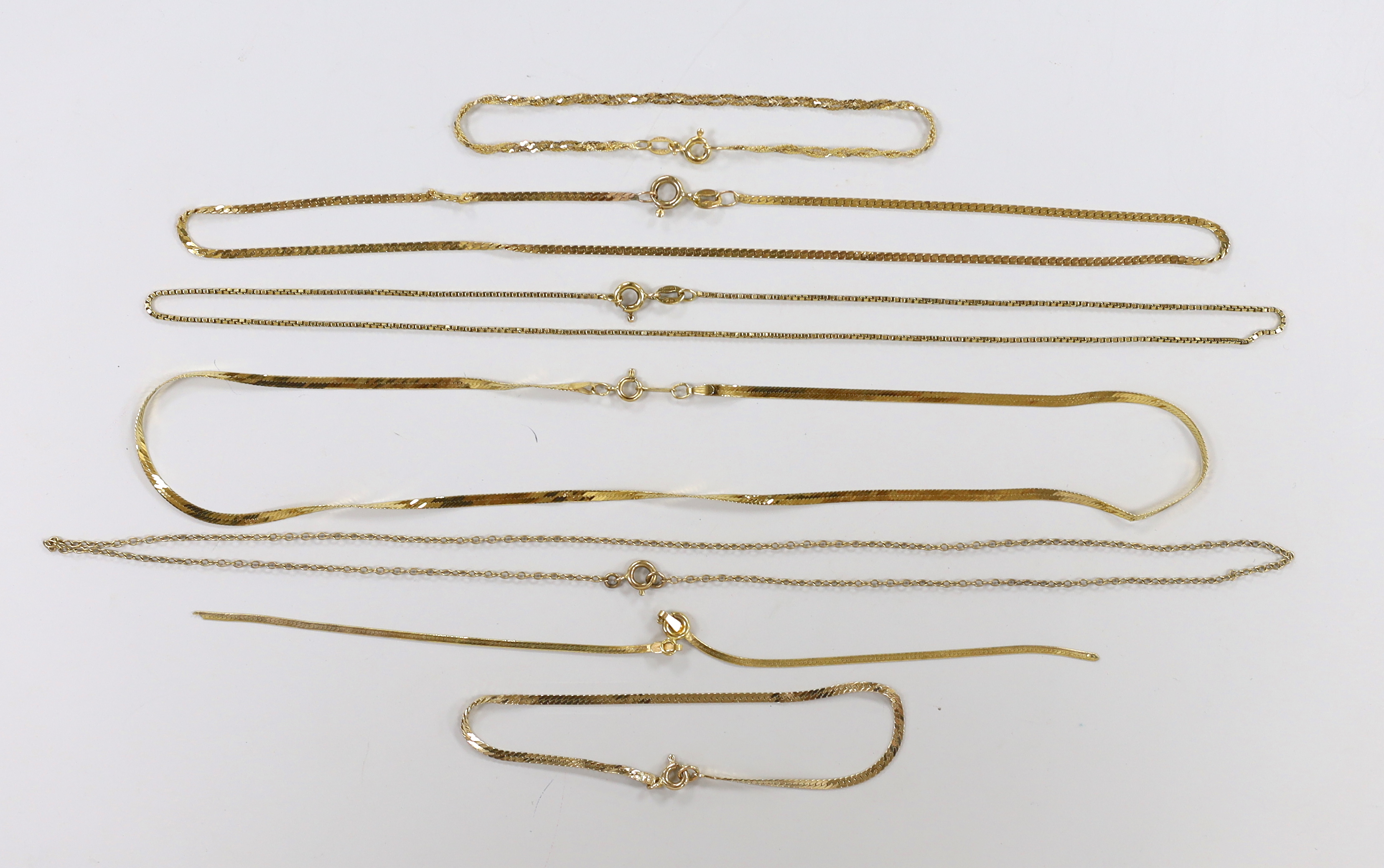 A modern 18k fine link chain, 40cm, 3.4 grams, two 14k bracelets, 2.7 grams, three 9ct chains (2 a.