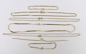 A modern 18k fine link chain, 40cm, 3.4 grams, two 14k bracelets, 2.7 grams, three 9ct chains (2 a.