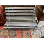 A vintage painted wrought iron slatted garden bench, width 119cm, depth 74cm, height 83cm