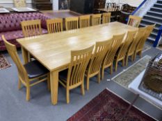 A large contemporary rectangular oak dining table, length 330cm, depth 119cm, height 76cm, and