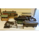 Three Bing tinplate O gauge locomotives, two Hornby tinplate buildings, various carriages, track