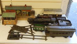 Three Bing tinplate O gauge locomotives, two Hornby tinplate buildings, various carriages, track