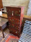 A Chinese lacquer four section cabinet, width 51cm, depth 31cm, height 128cm