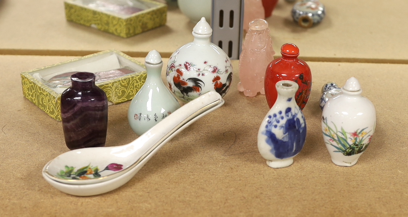 A collection of Oriental and Chinese items including quartz and hand painted snuff bottles, the