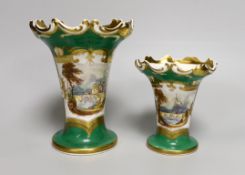 A pair of Rockingham type graduated vases with landscapes, tallest 17cm high