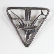 A Georg Jensen sterling 'dolphin amongst reeds' triangular brooch, design no. 257, 37mm.