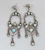 A large pair of white metal and man made opal cluster set drop earrings, approx. 92mm, gross