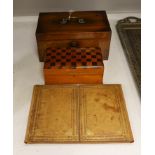 A George IV rosewood twin canister tea caddy, a chequer inlaid box and a leather blotter pad (3)