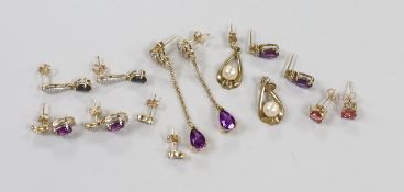 Six assorted modern pairs of 9ct and gem set earrings, including two pairs of amethyst and diamond