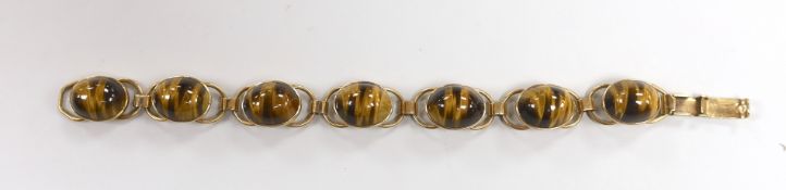 A 9ct and seven stone cabochon quartz set bracelet, 16.5cm, gross weight 29.4 grams.