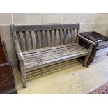 An Alexander Rose weathered teak garden bench, length 148cm, depth 60cm, height 90cm