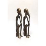 A pair of African figural bronzes, 27cm high