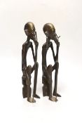 A pair of African figural bronzes, 27cm high